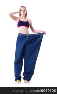 Woman with large jeans in dieting concept