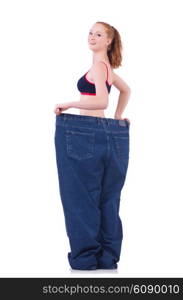 Woman with large jeans in dieting concept