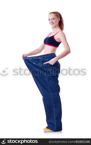 Woman with large jeans in dieting concept