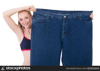 Woman with large jeans in dieting concept