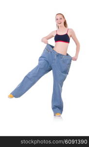 Woman with large jeans in dieting concept