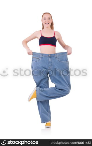 Woman with large jeans in dieting concept