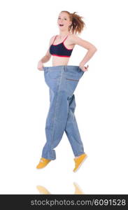 Woman with large jeans in dieting concept