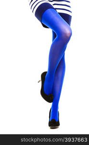 Woman with long legs and blue stockings isolated