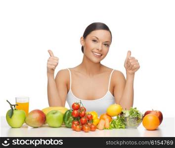 woman with lot of fruits and vegetables showing thumbs up. happy woman with fruits and vegetables
