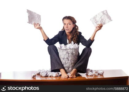 Woman with lots of discarded paper