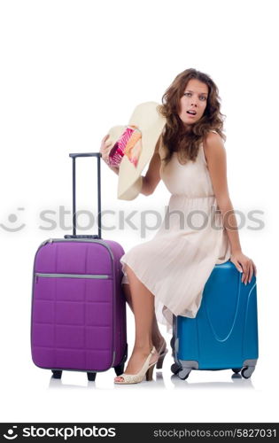 Woman with luggage isolated on white