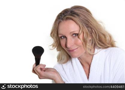 Woman with make-up brush