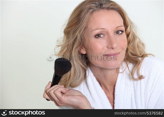 woman with make-up brush