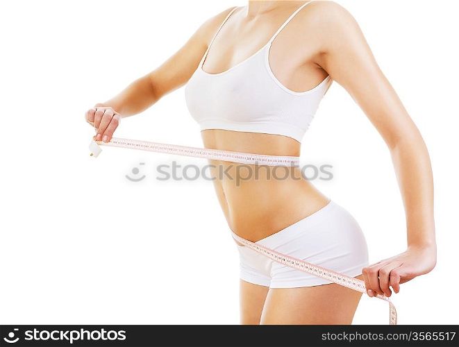 woman with measure on sporty body on white background