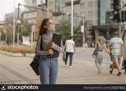 woman with medical mask outside