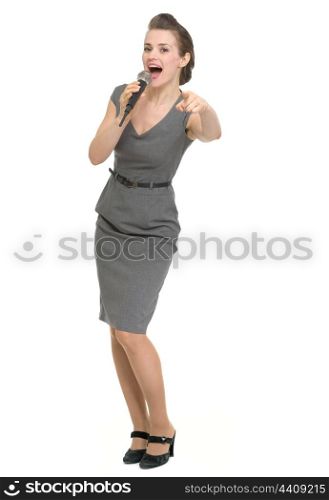 Woman with microphone pointing on you. HQ photo. Not oversharpened. Not oversaturated. Woman with microphone pointing on you isolated