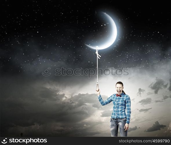 Woman with moon. Young woman in casual holding moon on lace