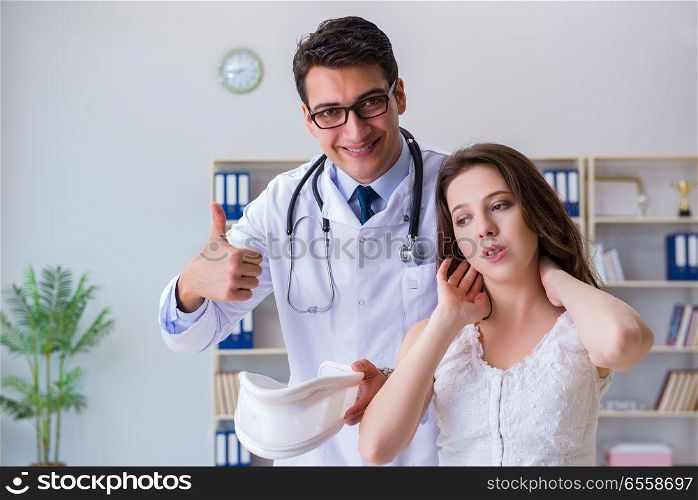 Woman with neck injury visiting doctor for check-up