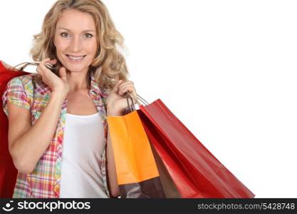 Woman with numerous shopping bags
