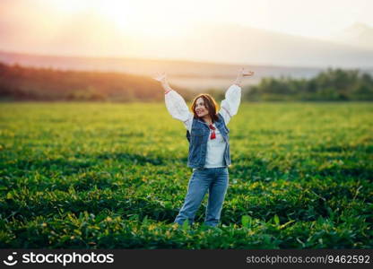 Woman with open up arms to sun. Hands up. Free girl, amazing summer adventure, countryside, rural scene. High quality. Woman with open up arms to sun. Hands up. Free girl, amazing summer adventure