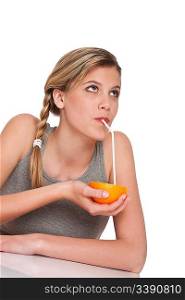 Woman with orange watching up on white background
