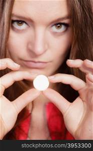 Woman with painkiller pill tablet. Health care.. Woman girl holding painkiller pill tablet. Health care. Headache and pain.
