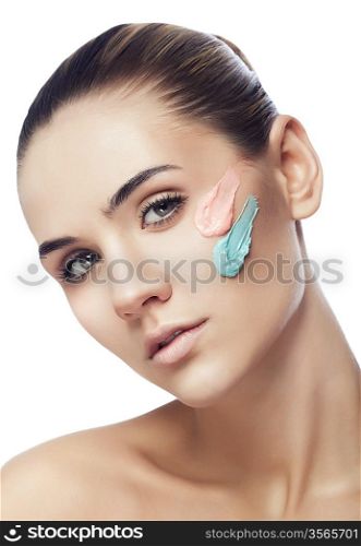 woman with paint strokes on face on white background