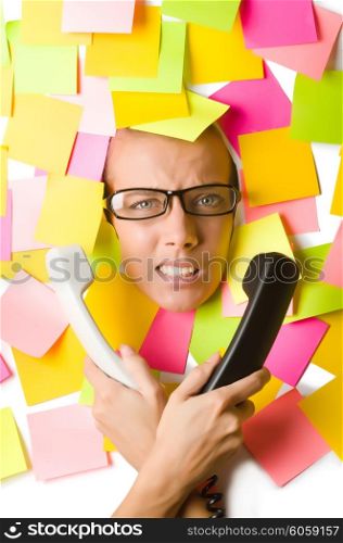 Woman with phone and reminder notes