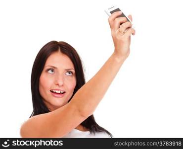 woman with phone isolated Young happy attractive female in red dress takes photos using her mobile phone isolated