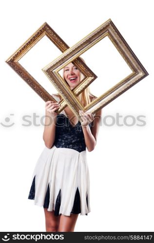Woman with picture frames on white