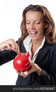 Woman with piggybank on white