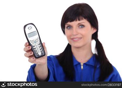 Woman with pigtails showing phone
