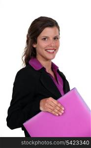 Woman with pink folder in hand