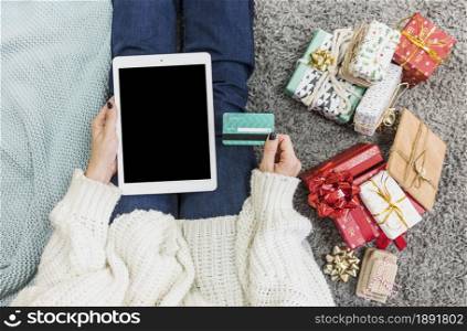 woman with presents credit card with tablet. Resolution and high quality beautiful photo. woman with presents credit card with tablet. High quality and resolution beautiful photo concept
