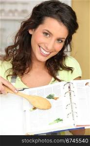 Woman with recipe book