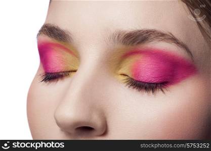 woman with red and yellow makeup closeup portrait isolated on white background