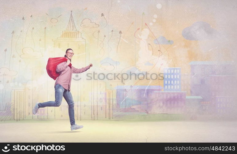 Woman with red bag. Young running girl with red santa bag in hands