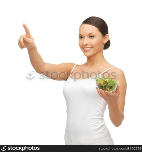 woman with salad pointing her finger at something