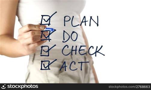 Woman with selective focus on hand writing plan, do, check, act with blue marker isolated on white background with copy space.