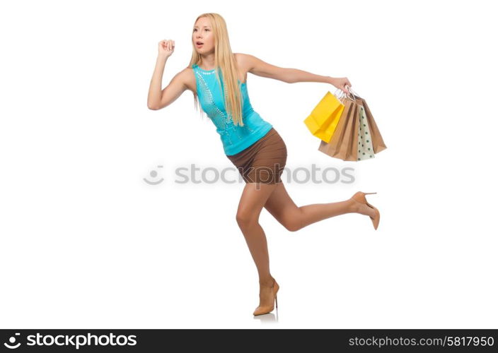 Woman with shopping bags isolated on white