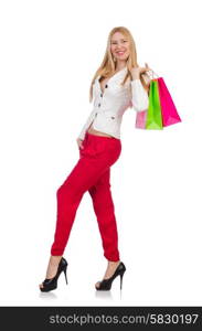 Woman with shopping bags isolated on white