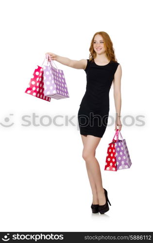 Woman with shopping bags isolated on white