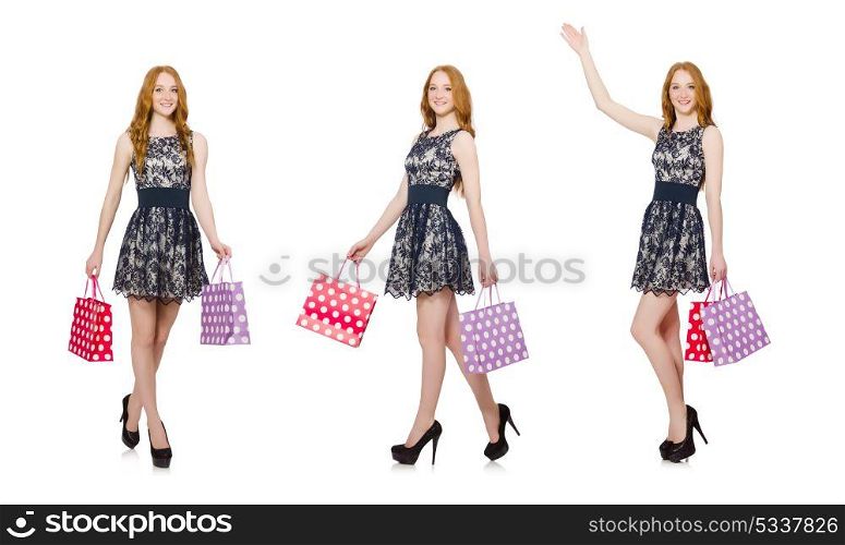 Woman with shopping bags isolated on white. The woman with shopping bags isolated on white