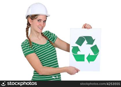 Woman with sign and recycling symbol