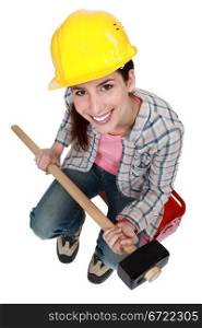 Woman with sledge-hammer