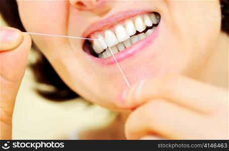 woman with some dental floss