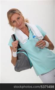 Woman with sports bag over shoulder