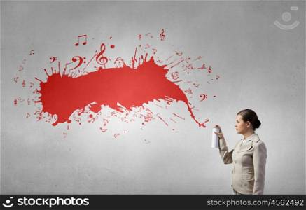 Woman with spray can. Pretty businesswoman spraying red speech cloud from container