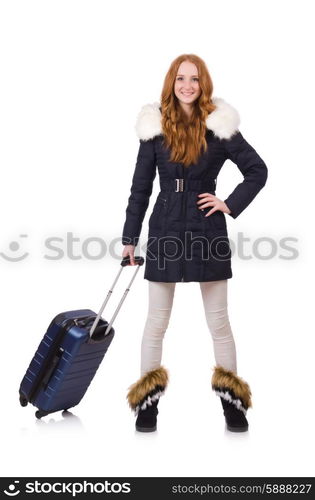 Woman with suitcase preparing for winter vacation