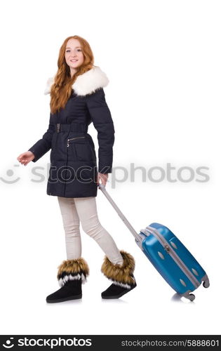 Woman with suitcase preparing for winter vacation