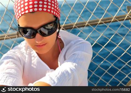 woman with sunglasses face portrait sea background