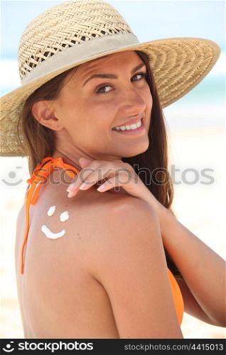 woman with sunscreen