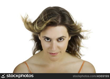 Woman with swind swept hair in studio