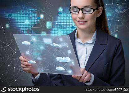 Woman with tablet in cloud computing concept